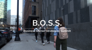 Urban city sidewalk with people walking past a tall gray stone wall; large white text reads "B.O.S.S." and below, "Business Owner Strategies Summit" on a banner.