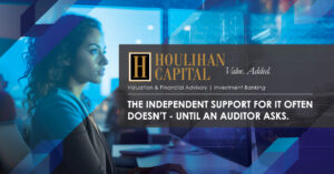 Professional woman at a computer in a blue financial services banner featuring Houlihan Capital branding and the slogan 'Value. Added.'